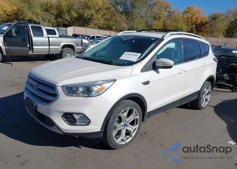 2018 Ford Escape Titanium из США, поврежденный, VIN 1FMCU9J91JUB60848